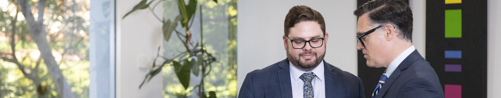 Lawyers engaged in meeting at Solomon Hollett office